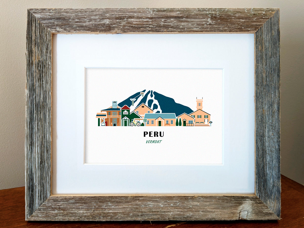Framed art print of buildings arranged in a skyline with the text Peru Vermont
