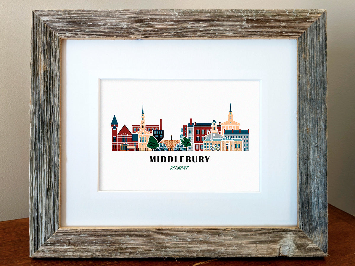 Framed art print of buildings arranged in a skyline with the text Middlebury Vermont