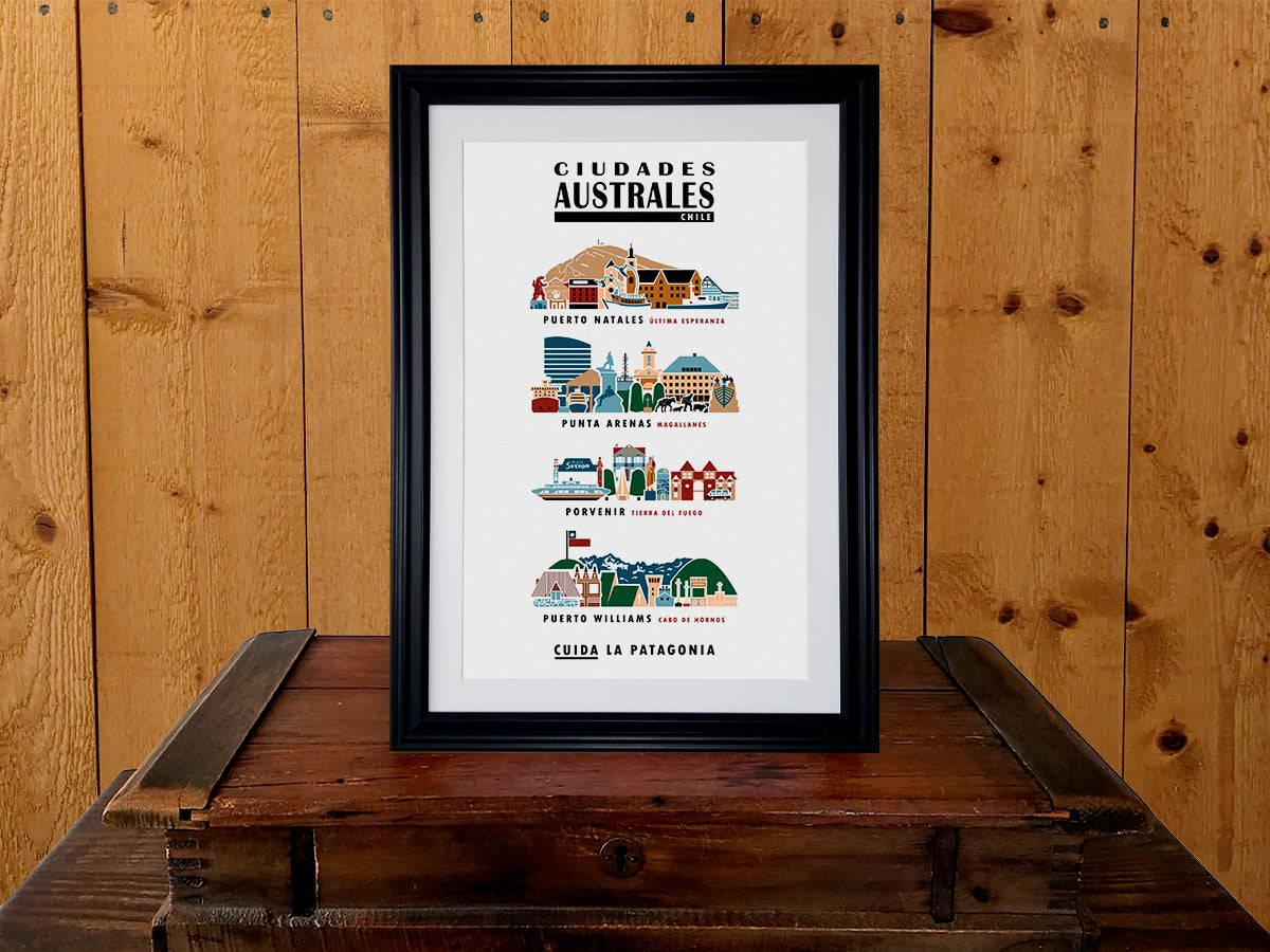 Framed vertical poster with buildings and landmarks in a city skyline arrangement. Poster title reads Ciudades Australes Chile, Cuida La Patagonia. And the four featured towns listed are Puerto Natales Última Esperanza, Punta Arenas Magallanes, Porvenir Tierra del Fuego, and Puerto WIlliams Cabo de Hornos.